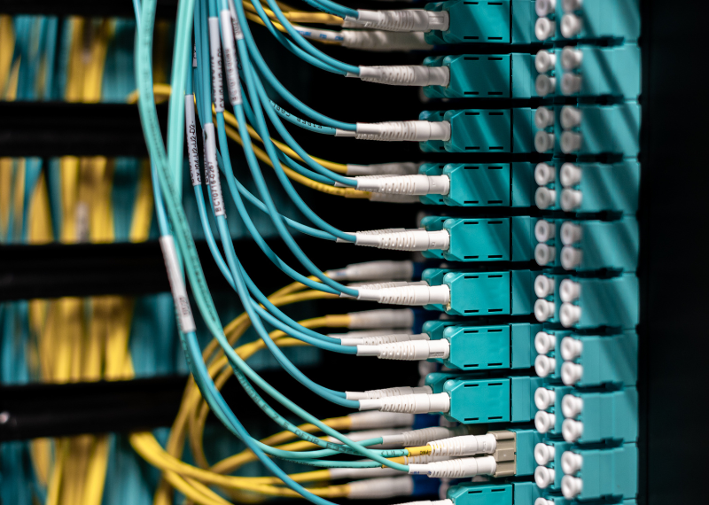 High-tech network operations center (NOC) with multiple monitoring screens (1)